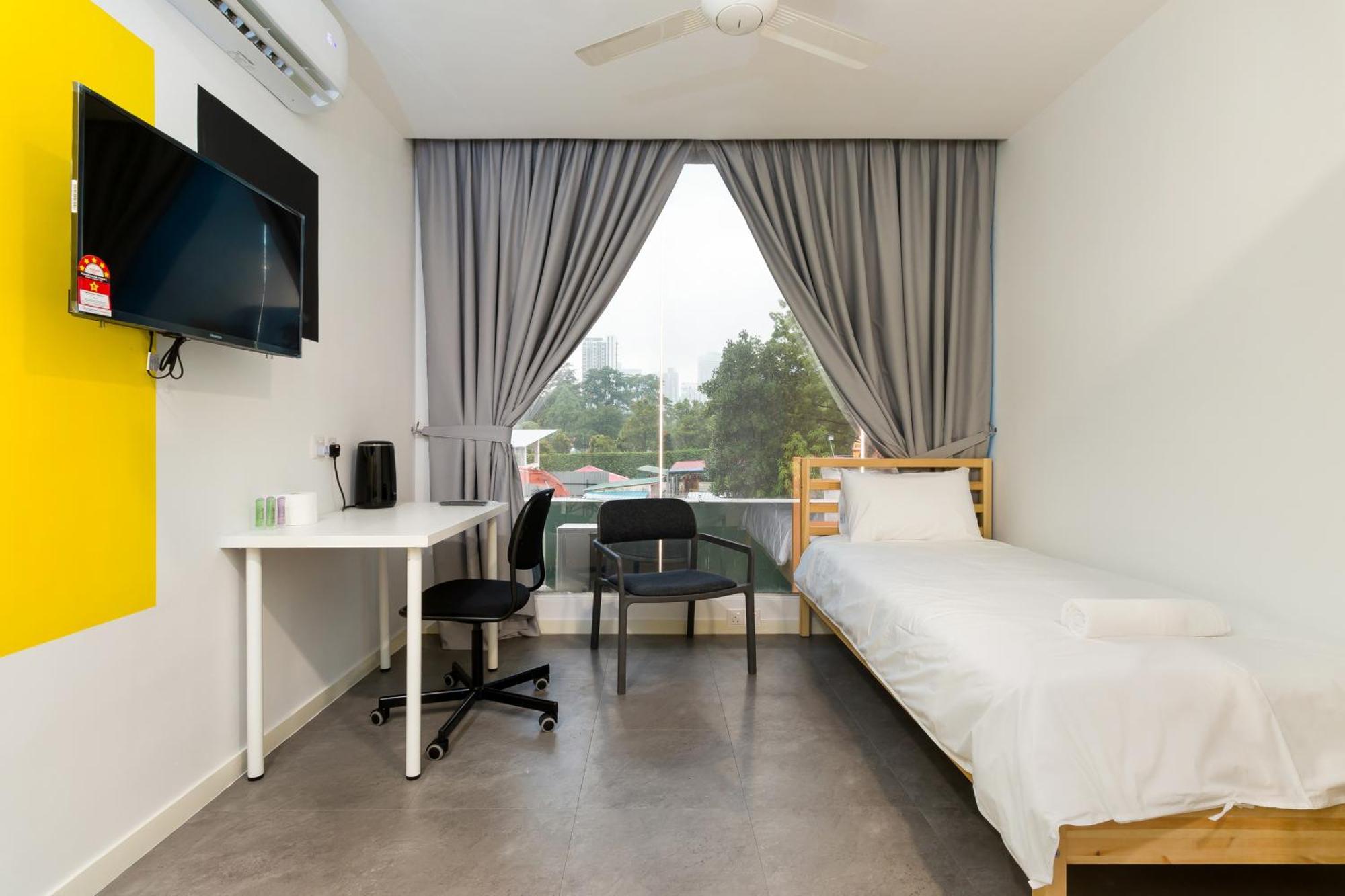 Upstairs Downstairs Coliving Kampung Pandan *